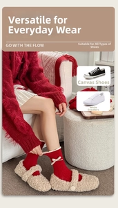 Detail of red crew socks featuring sweet white lace ruffles and cute bow accents