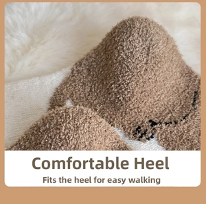 Close-up of the thick plush heel on cute wool socks featuring soft brown fabric
