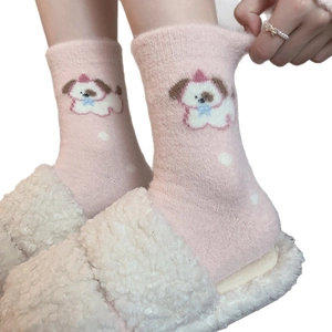 Pink puppy pattern thermal socks in soft fluffy fleece shown with white slippers