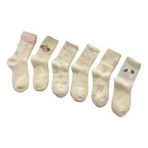 Fluffy mid-calf socks with cute cartoon dogs and vibrant patterns in a 6-pair set