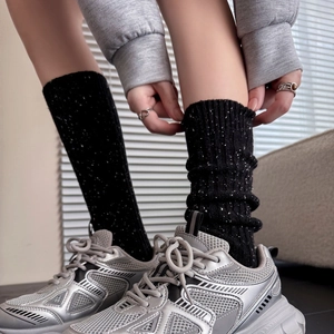 Thick thermal wool crew socks with speckle pattern and stylish chunky sneakers