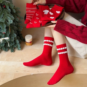 Festive red cotton crew socks with puppy embroidery and pom-poms for Christmas gift