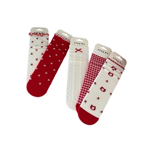 Five-pack of red and white crew socks with floral patterns, plaid, and bear designs