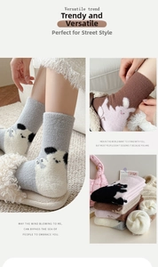 Close-up of thick coral fleece winter socks with cute cartoon animal patterns
