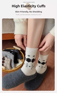 Close-up of thick wool socks with retro argyle pattern and elastic ribbed cuffs