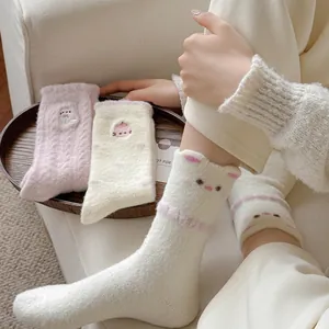 Plush thermal mid-calf socks with cute cartoon embroidery and soft faux fur texture