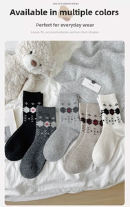Detailed knit texture of Argyle wool socks in various neutral winter colors