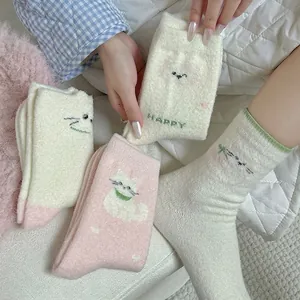 Thick warm winter socks for women with cute cat patterns in soft plush coral fleece fabric