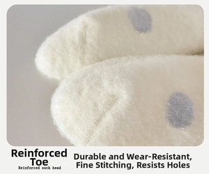 Close-up of reinforced sock head with gray dot pattern on soft white thermal fleece