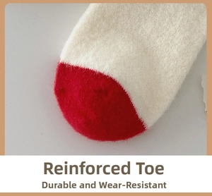 Close-up of thickened knitted sock showing reinforced red toe detail and soft fleece texture