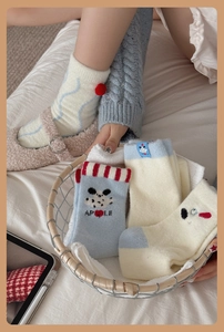 Thick warm velvet socks featuring cute cartoon patterns and festive red stripe details