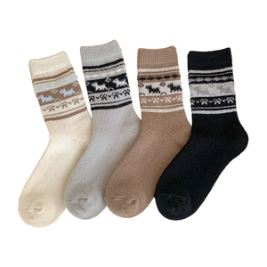 Set di quattro paia di calze di lana spesse con motivi jacquard a forma di cane