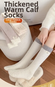 Detail of coral fleece calf socks with striped pattern and cute bear fabric patch