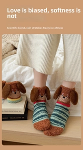 Detailed view of 3D dachshund coral fleece socks with striped pattern and puppy ears