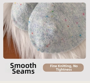 Detail view of smooth toe seam and rainbow speckled wool socks with soft knit texture