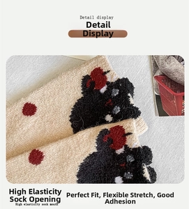 Detailed macro of high elasticity sock cuff with red polka dots and cartoon bear pattern