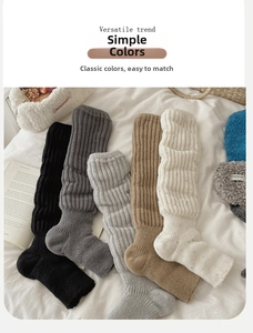 Detailed knit texture of wool leg warmers in various colors for winter fashion