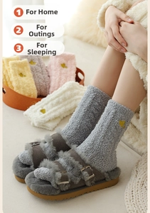 Detail of coral fleece winter socks with heart embroidery and plush slide slippers