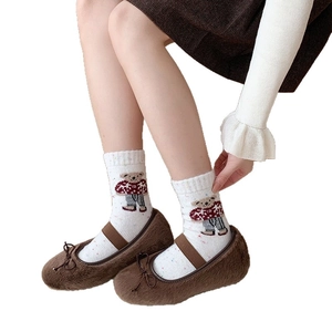 Winter wool teddy bear socks paired with plush Mary Jane shoes and brown bow straps