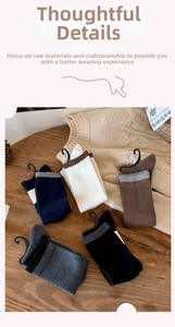 Cozy wool blend calf socks in five colors arranged on a rustic wooden table for autumn