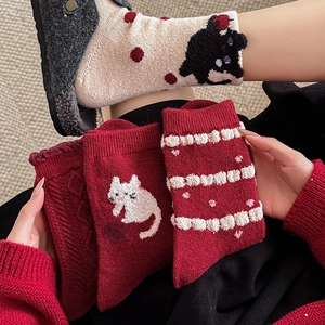 Cozy wool blend mid-calf socks with cute cartoon cat motifs and festive red patterns