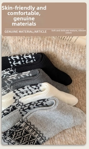Detailed knit texture of vintage Fair Isle pattern wool socks in a cozy multi-pack set