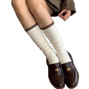 Japanese style wool calf socks with color blocking paired with classic leather loafers