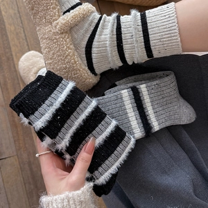 Thick striped wool socks for women with cozy textured knit and soft fuzzy details