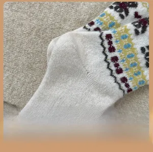 Detail view of reinforced heel construction on Fair Isle patterned wool socks