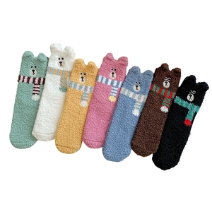 Seven pairs of coral fleece socks with 3D bear ears and cute embroidery in various colors