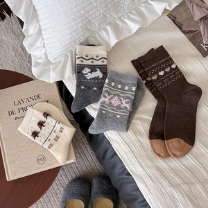 Cozy wool blend socks set with Fair Isle puppy and snowflake patterns for winter warmth