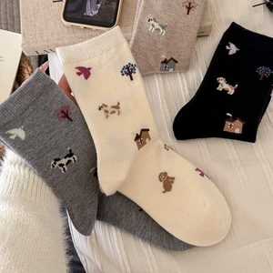 Cozy thermal wool socks for women with cute cartoon puppy patterns in neutral tones