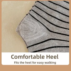 Detail of reinforced heel construction on black and grey striped wool blend socks