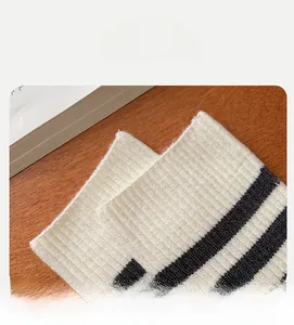 Close-up of high elasticity striped sock mouth showing the soft ribbed knit texture