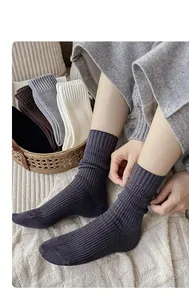 Detailed knit texture and color options of warm mid-calf cashmere-like socks