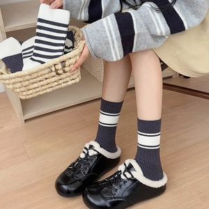 Striped cotton crew socks in Korean style with classic black and white horizontal patterns