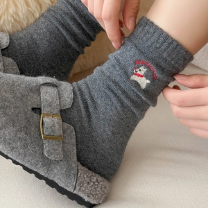 Cozy wool knit crew socks in dark grey with cute white puppy embroidery and ribbed cuffs