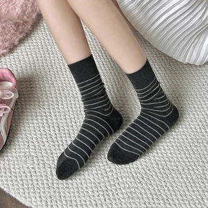 Deep grey striped wool blend socks for women with cozy knitted texture and rib cuffs