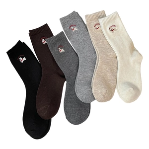 Set of six colorful wool blend socks featuring cute puppy embroidery and ribbed cuffs