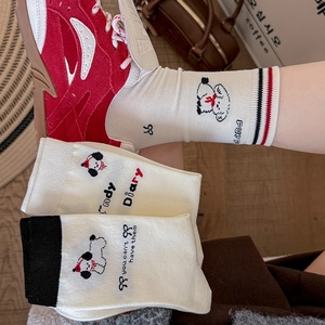 Cream crew socks featuring cute cartoon puppy embroidery and stylish bow accents