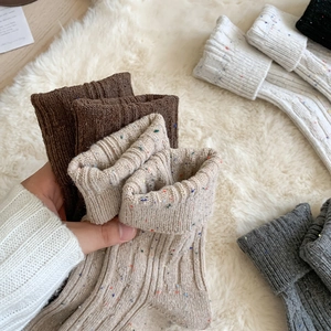 Thick ribbed knit wool socks with colorful nep yarn dots for winter warmth
