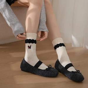 Cat embroidery mid-calf socks with polka dot yarn and bow Mary Jane shoes on wooden floor