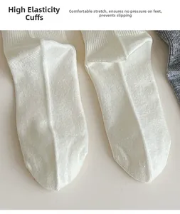 Detail of high-elasticity ribbed cuffs on cotton blend crew socks for non-slip comfort
