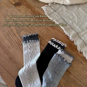Silk wool blend crew socks with vintage diamond patterns and ruffled trim for winter warmth