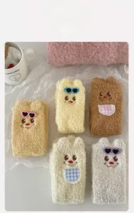Set of five warm coral fleece socks with cute cartoon bear designs and bow ties