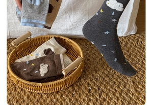 Detail of colorful Japanese style flocking socks with cloud and star jacquard patterns