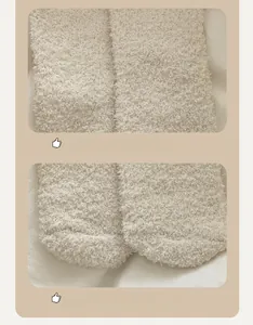 Detail of coral fleece socks showing reinforced heel and smooth toe seam construction