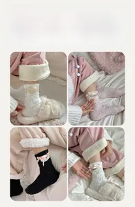 Detail of coral fleece winter socks featuring elegant pink bows and pearl pendant charms