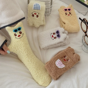 Five pairs of thick coral fleece socks with cute cartoon bear embroidery and colorful decor