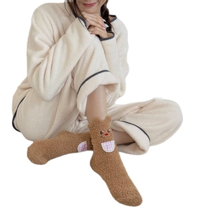 Cute brown coral fleece socks for women featuring cartoon bear embroidery and plaid pocket